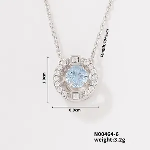 Detail view of the silver necklace with blue zircon pendant including sizing and dimensions