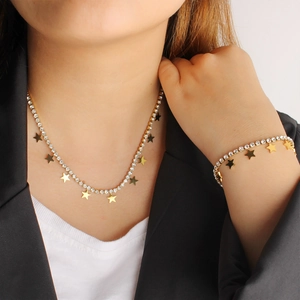 Elegant gold star necklace and bracelet jewelry set with crystal tennis chain
