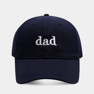 Classic navy blue cotton baseball cap with white dad embroidery and a curved brim style