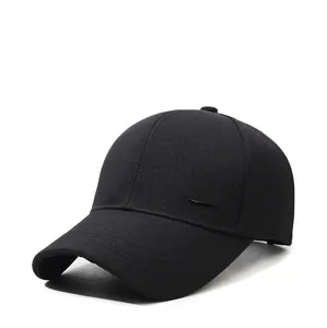 Detail of a black cotton baseball cap showing the side profile and small metal Fashion label