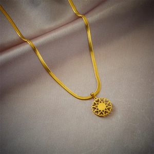 Gold titanium steel snake chain necklace with hollow round sunflower pendant on silk