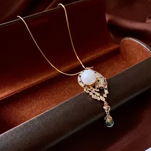 Luxury leopard head pearl necklace with sparkling zircon accents on gold snake chain