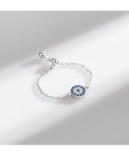 Macro view of S925 sterling silver evil eye chain ring with blue stones and sliding bead