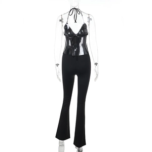 Detail of sexy black backless jumpsuit with deep V-neck and stylish flared leg design