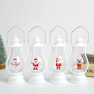 Set of 4 white Christmas LED lanterns featuring snowman, Santa, and reindeer designs
