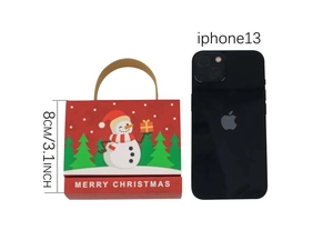 Christmas snowman candy gift bag showing 8cm height measurement next to iPhone