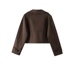 Back view of a cropped dark brown trench coat with windbreaker flap and sleeve buckles