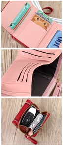 Detailed interior of bi-color foldable wallet with multiple card slots and gold zipper