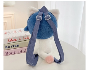 Detailed back view of a plush shark cat backpack with adjustable blue straps and soft tail