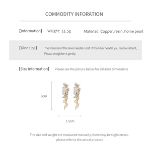 Detailed size chart for long floral pearl tassel earrings with copper and resin specs