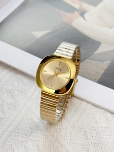 Detail of vintage golden square women watch with flexible metallic elastic strap