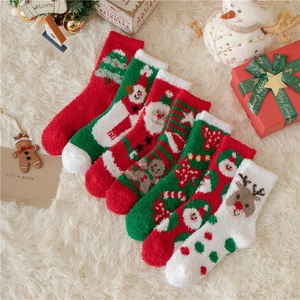 6-pack of festive Christmas coral fleece socks featuring Santa and reindeer motifs