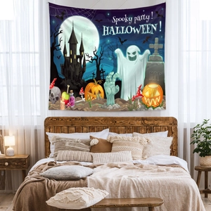 Detail of Halloween tapestry with spooky castle, moon, and pumpkin in a bedroom setting
