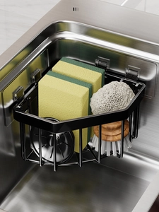 Detailed view of matte black stainless steel sink caddy for sponges and brushes
