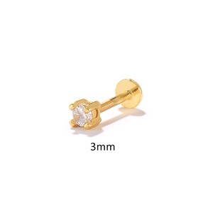 Macro detail of a 3mm round clear zircon gold plated labret stud with 4-claw setting
