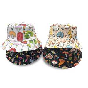 Double-sided reversible bucket hat with colorful cartoon mushroom pattern in cotton canvas