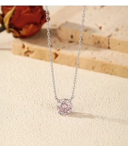 Close-up of S925 sterling silver necklace with pink rose-cut cubic zirconia pendant
