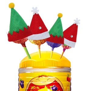 Mini plush Christmas hats used as festive covers for lollipops in a yellow container