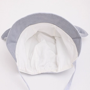 Detail of the soft corduroy inner lining and chin strap on this baby bunny ear hat