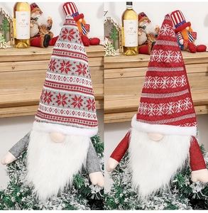 Close-up of festive Christmas gnomes with snowflake hats and long white beards decor