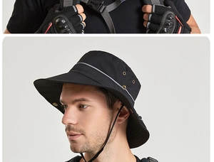 Détail du chapeau de soleil tactique noir avec large bord, bande réfléchissante et mentonnière