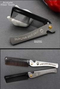 Detail of folding beard comb featuring acetate teeth and stainless steel handle with opener