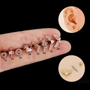 Rose gold heart and butterfly surgical steel ear studs set with sparkling zircon stones