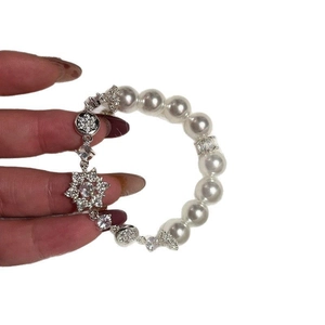 Elegant French pearl bracelet with zircon flower charm and white beads for women