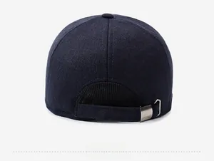 Detail of the adjustable metal buckle and textured fabric on the back of this winter cap