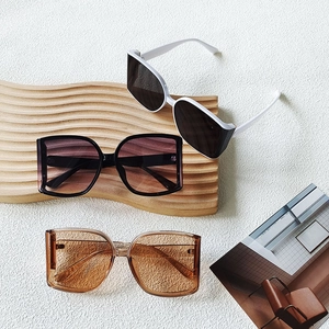 Fashionable oversized polygonal sunglasses set in white, black, and tea brown colors