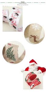 Detail view of festive linen ribbons featuring reindeer and snowman prints for Christmas decor