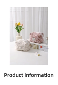 Detail of corduroy makeup bag with floral lace embroidery in a cozy home setting