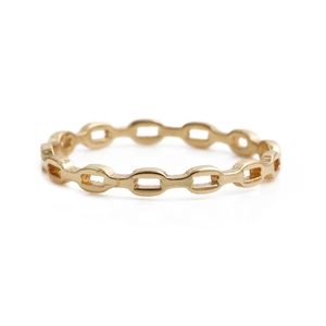 Minimalist gold chain link ring with polished metallic finish on a white background