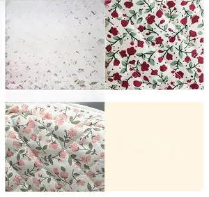 Detailed view of floral quilted fabric featuring fine stitching and vintage patterns