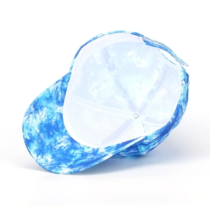 Detailed view of tie-dye baseball cap interior stitching and curved brim structure