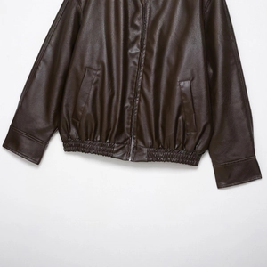 Dark brown faux leather bomber jacket with zipper closure and elasticated hem details