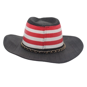 Western cowboy hat with American flag stripes and golden chain on black woven brim