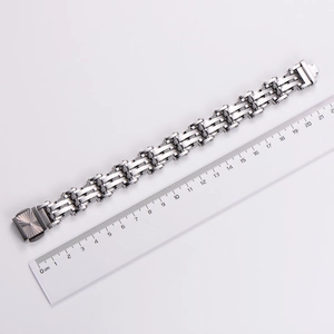 Close-up of polished stainless steel bike chain bracelet measuring 22cm in length
