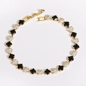 Detail of 18k gold plated spacer bead with square black and clear cubic zirconia