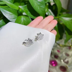 Silver snowflake ear clips with sparkling AAA zircon and comfortable silicone pads