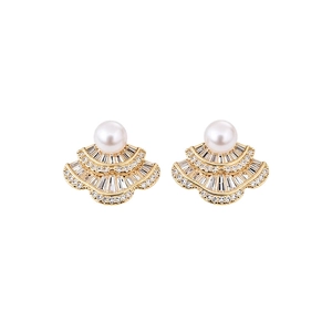 Vintage style gold fan-shaped stud earrings with zircons and white pearls on white background