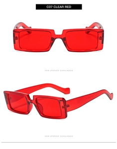 Detail view of rectangular vintage sunglasses in clear red color with thick frames