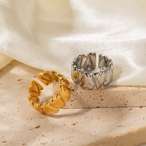Minimalist stainless steel open rings with continuous heart patterns in gold and silver