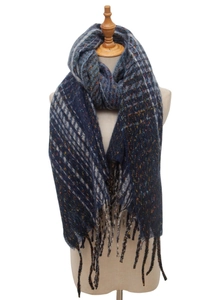 Detail of dark blue checkered knit scarf with colorful specks and fringe tassels