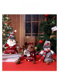 Three-piece Christmas gift bags set featuring Santa, Reindeer, and Snowman plush decor