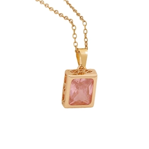 Elegant gold necklace with pink rectangular zircon pendant and floral leaf accents