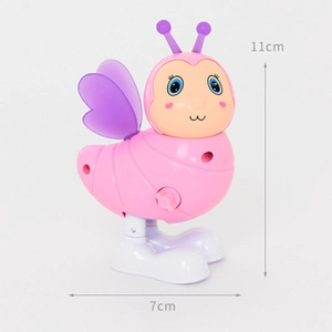 Jouet mécanique d'insecte rose avec ailes violettes mesurant 11 cm de haut et 7 cm de large