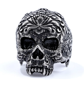 Macro shot of vintage skull ring in silver steel with gothic pirate design details