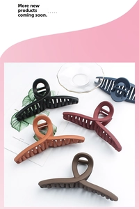 Detailed view of matte large hair claw clips in five colors for thick hair styling