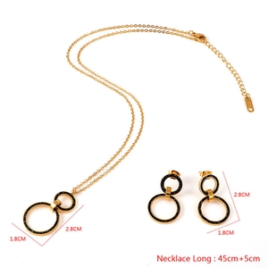 Golden stainless steel Roman numeral jewelry set with hollow rings and black crystals